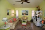 Great Room including large TV and Ceiling Fan